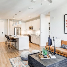 Gorgeous living areas to entertain and enjoy a living room with a couch and a table