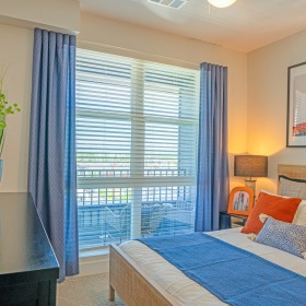 Bedroom with large windows